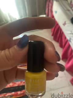 small yellow nail polish 0