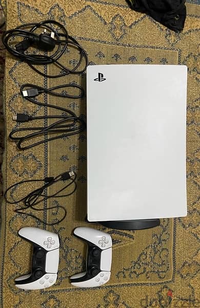 ps5 with 2 controllers + ps5 bag 2