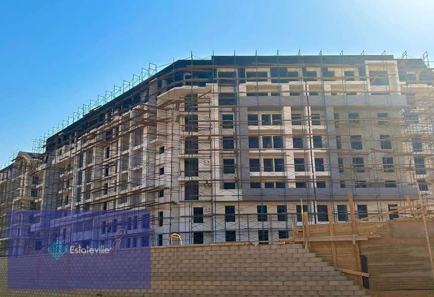 With a 15% discount, an apartment for sale, ready for viewing and installments over 6 years, next to two universities, DMA Engineering Consultant 6