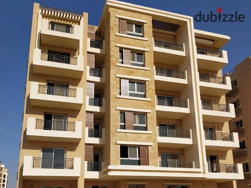 Apartment for sale, 136 square meters, in Taj City, with a 5% down payment and a cash discount of up to 39% in the Fifth Settlement | taj city 1