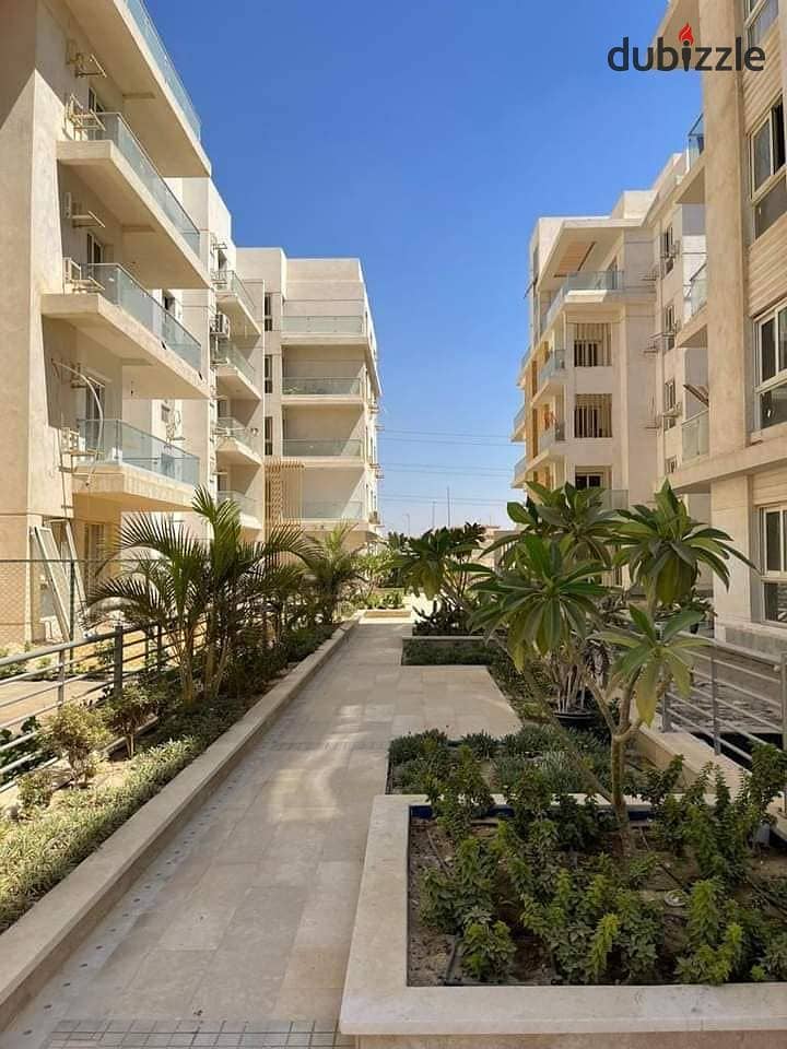 Ground floor apartment with garden near Sheikh Zayed in Mountain View iCity October Minutes from Mall of Arabia and the northern expansions 3