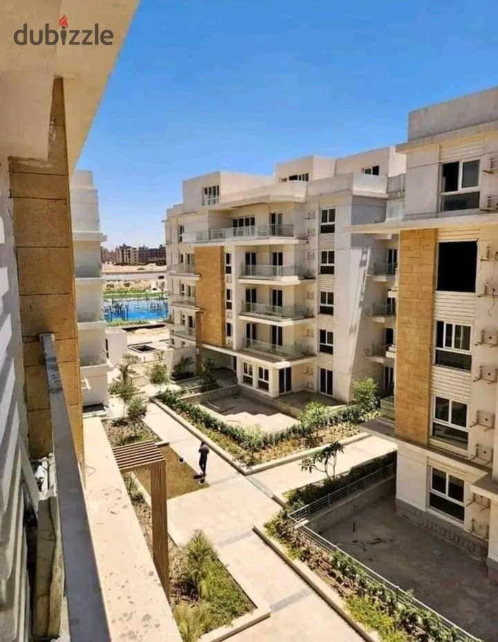 Ground floor apartment with garden near Sheikh Zayed in Mountain View iCity October Minutes from Mall of Arabia and the northern expansions 4