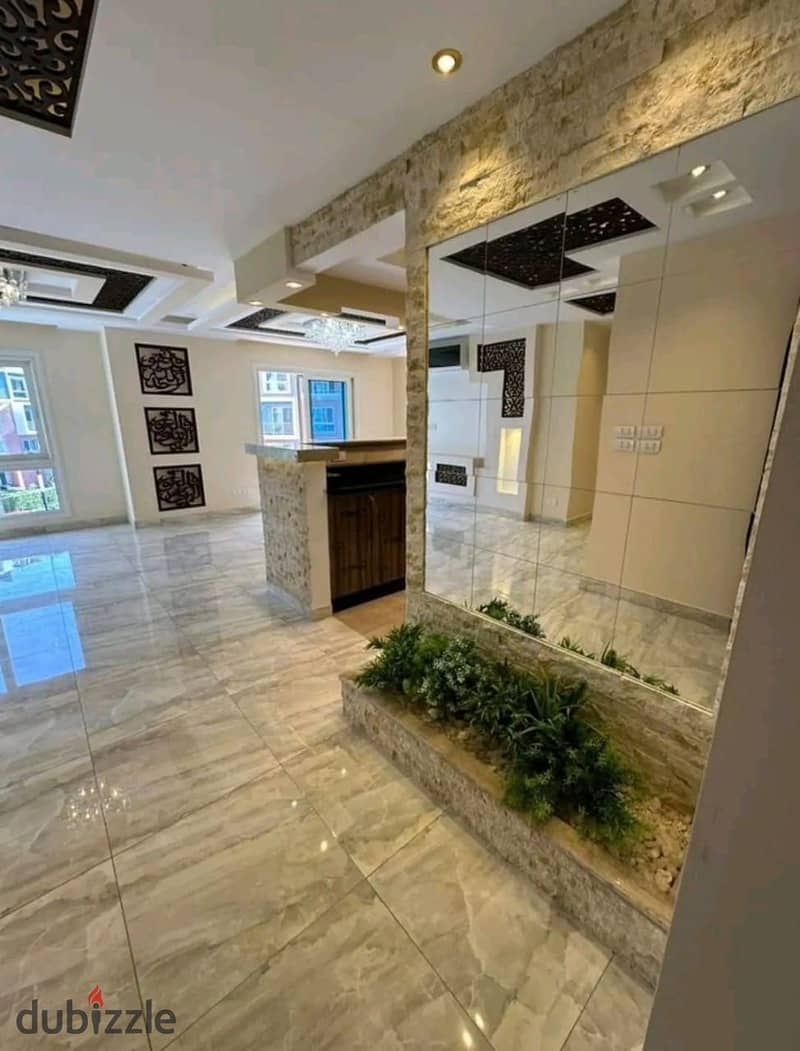 For sale ground apartment with a private garden in the first settlement in front of Kempinski Hotel and in front of the gate of Cairo Airport, 3