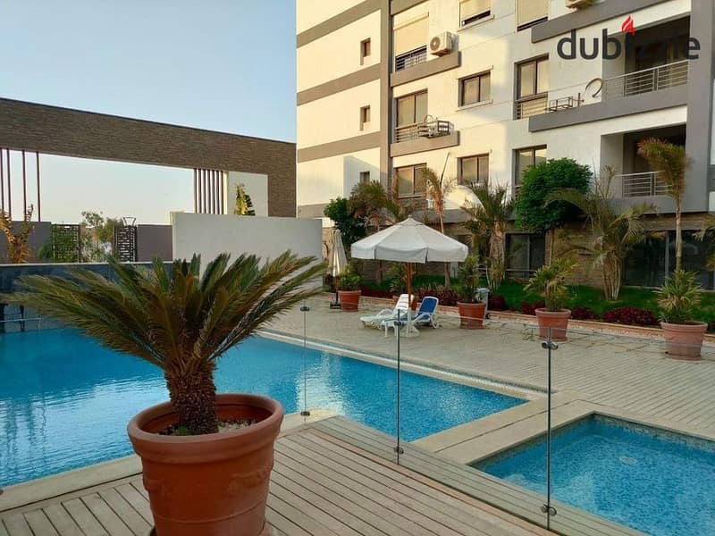 For sale ground apartment with a private garden in the first settlement in front of Kempinski Hotel and in front of the gate of Cairo Airport, 8