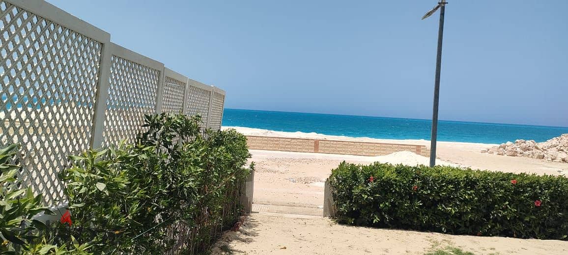 twin house for sale first row sea in north coast (loutas)near to marina 0