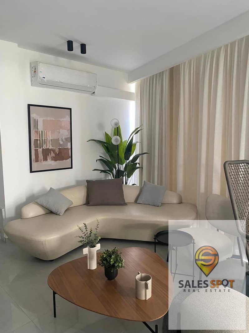 In installments over 10 years, a 164 sqm, finished apartment for sale in Bloom Fields Compound in the heart of Mostakbal City, near Madinaty 7