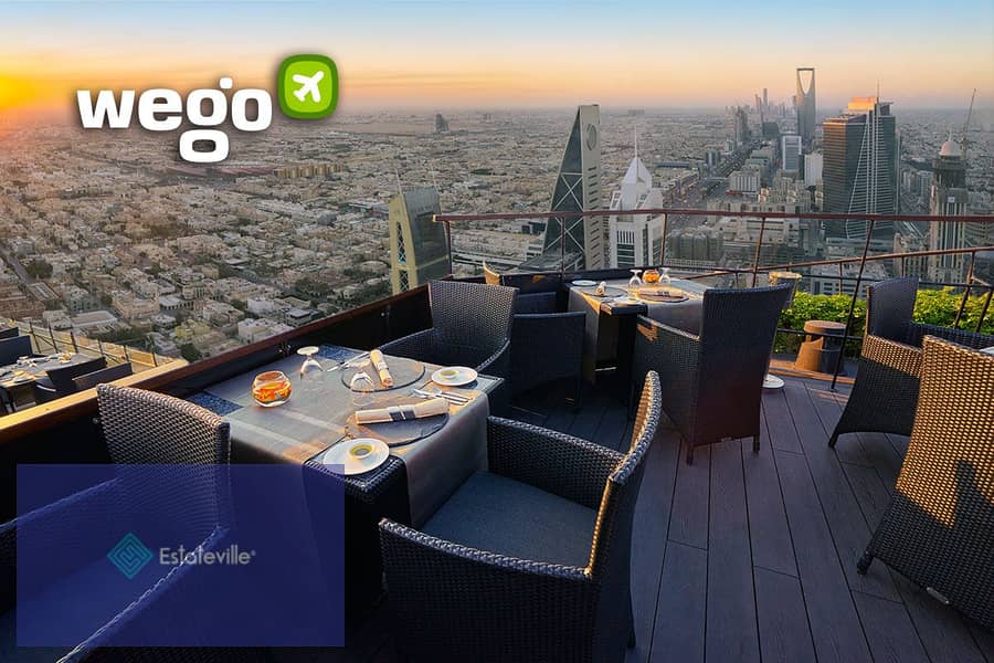 Sky Roof Restaurant and Café with a panoramic view of Al-Massa Hotel and the iconic tower in the shopping and recreation district and in front of the 4