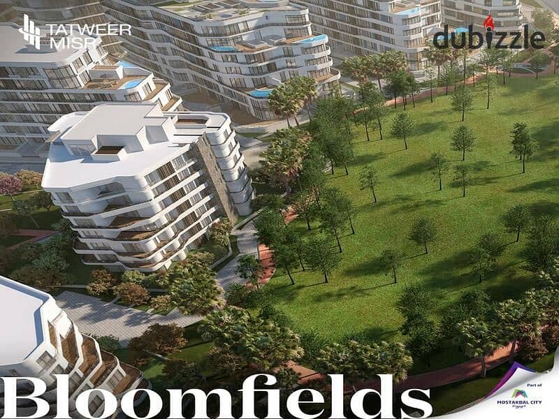 Apartment with private garden and fully finished in front of Madinaty in Bloomfields Compound only And get a discount over 10 years with a 5% DP 22