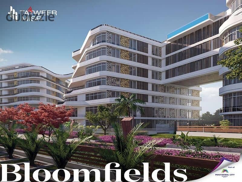 Apartment with private garden and fully finished in front of Madinaty in Bloomfields Compound only And get a discount over 10 years with a 5% DP 23