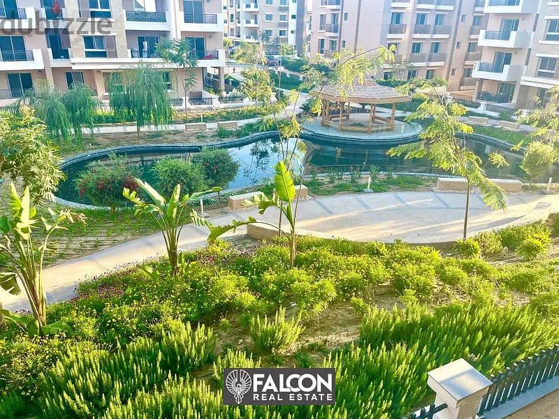 Apartment for sale in Taj City Gate 2 in front of Cairo Airport with an open view on the largest landscape in the project with a 42% discount 2