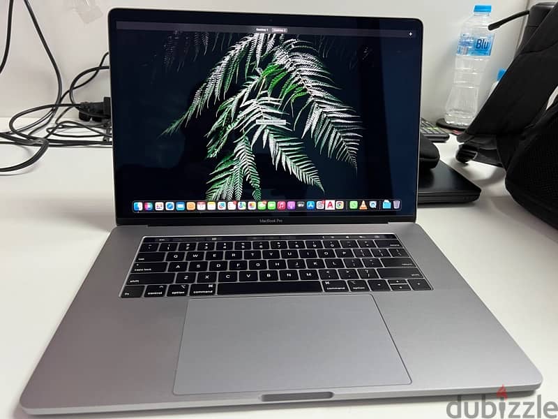 macbook pro 2018 ( corei7, 16GB ram ,15 inch , 512GB ssd , touch bar ) 1