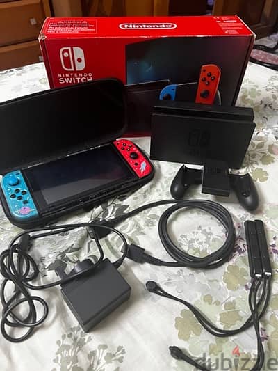 Nintendo Switch v2 with box and all accessories + 2 cases