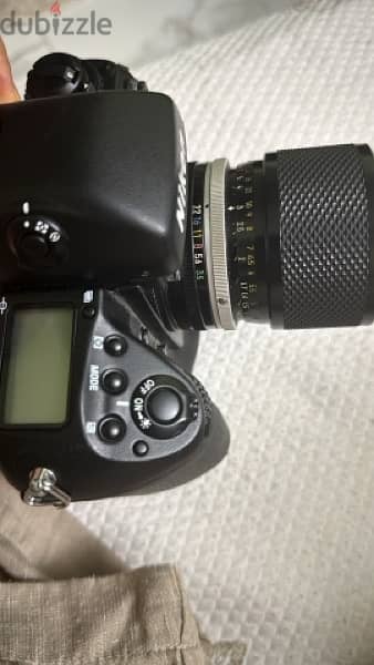 Nikon  zoom Nikkor  نيكون f5 7