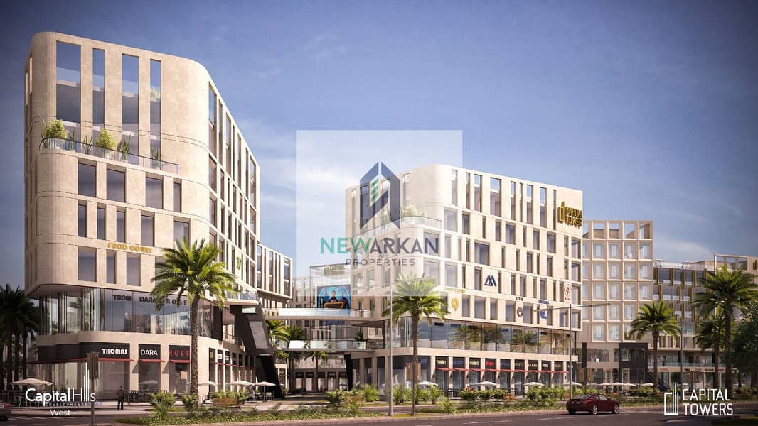 Invest and own a shop directly in front of a hotel on the axis directly in 6th October City, with lowest down payment and instalments for the longest 12