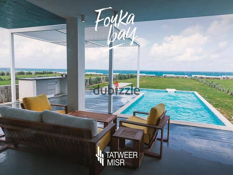 Chalet for sale in Fouka Bay Tatweer Misr, fully finished with air conditioning 5% down payment with view directly on the lagoon Special cash discount 9