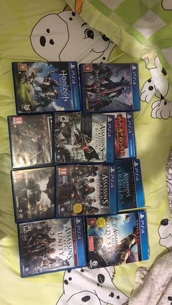 Ps4 fat 1 terabyte plus two controllers and 10 cds 3