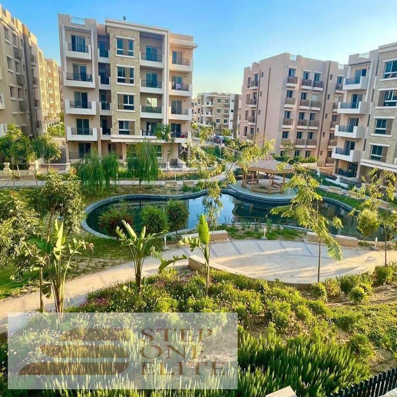 Apartment with private garden for sale in the most prestigious compound in New Cairo near Madinaty 0