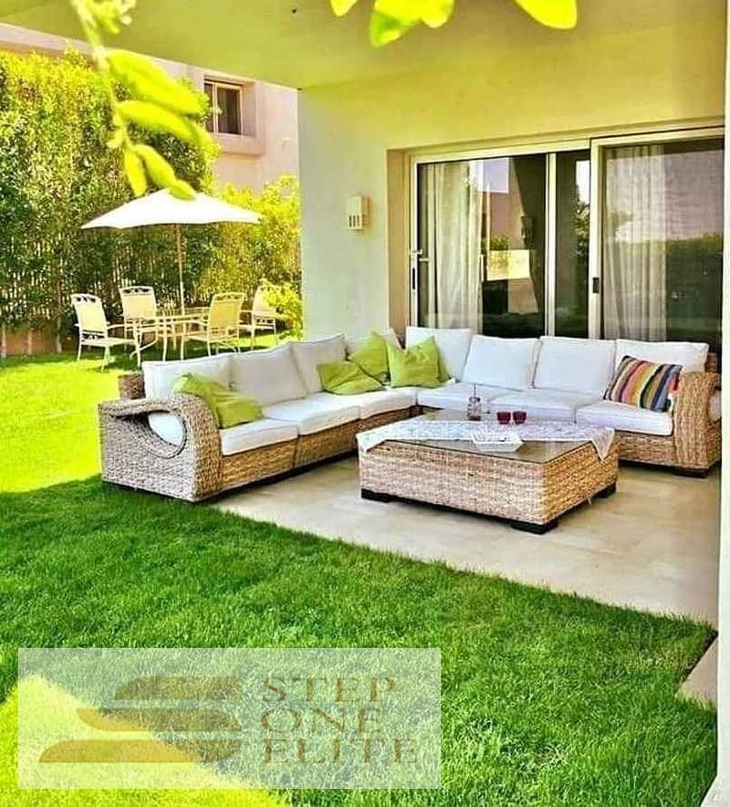 Apartment with private garden for sale in the most prestigious compound in New Cairo near Madinaty 2