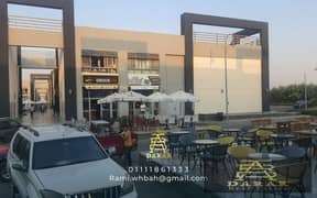 Restaurant and cafe for rent in Madinaty, Craft Zone, first blocks, furnished with equipment, air conditioners, appliances and furniture 0