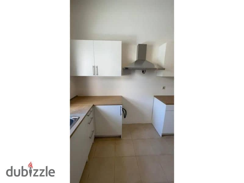 Town house for sale in Mivida Kitchen + ACs 158m . 1