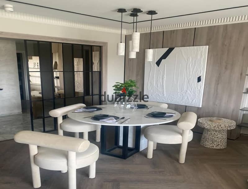 Apartment for sale, ground floor with garden in Palm Hills New Cairo, Lagoon view, down payment only 535 thousand and installments over 8 years 3