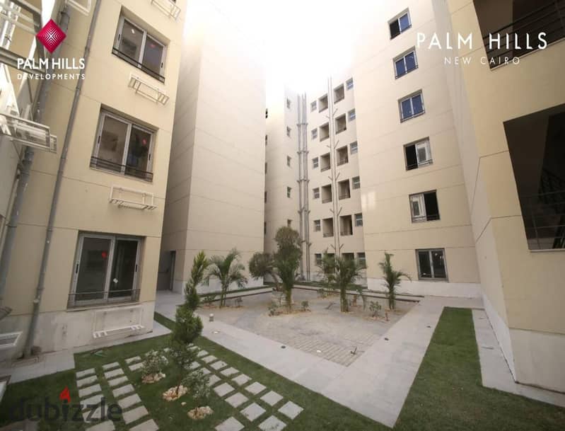 Apartment for sale, ground floor with garden in Palm Hills New Cairo, Lagoon view, down payment only 535 thousand and installments over 8 years 6