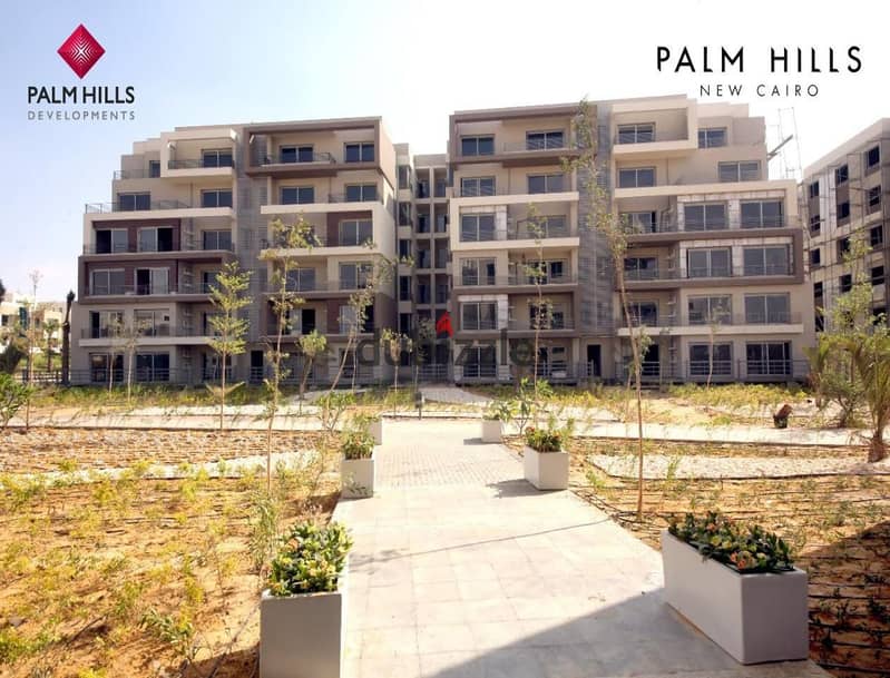 Apartment for sale, ground floor with garden in Palm Hills New Cairo, Lagoon view, down payment only 535 thousand and installments over 8 years 8