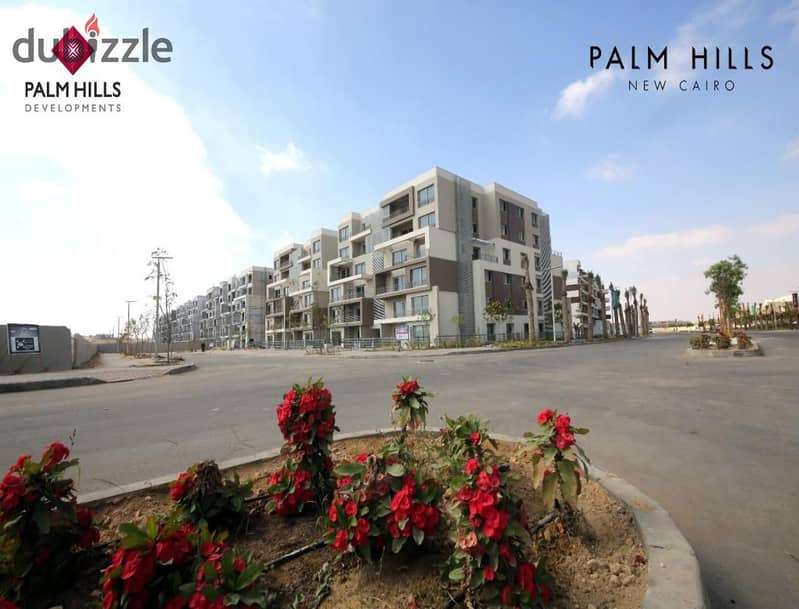 Apartment for sale, ground floor with garden in Palm Hills New Cairo, Lagoon view, down payment only 535 thousand and installments over 8 years 10