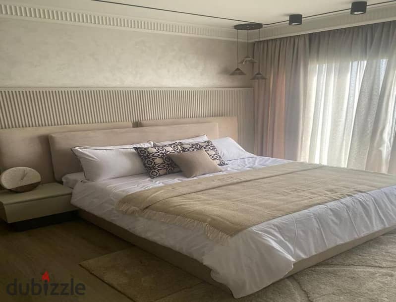 Apartment for sale, ground floor with garden in Palm Hills New Cairo, Lagoon view, down payment only 535 thousand and installments over 8 years 26