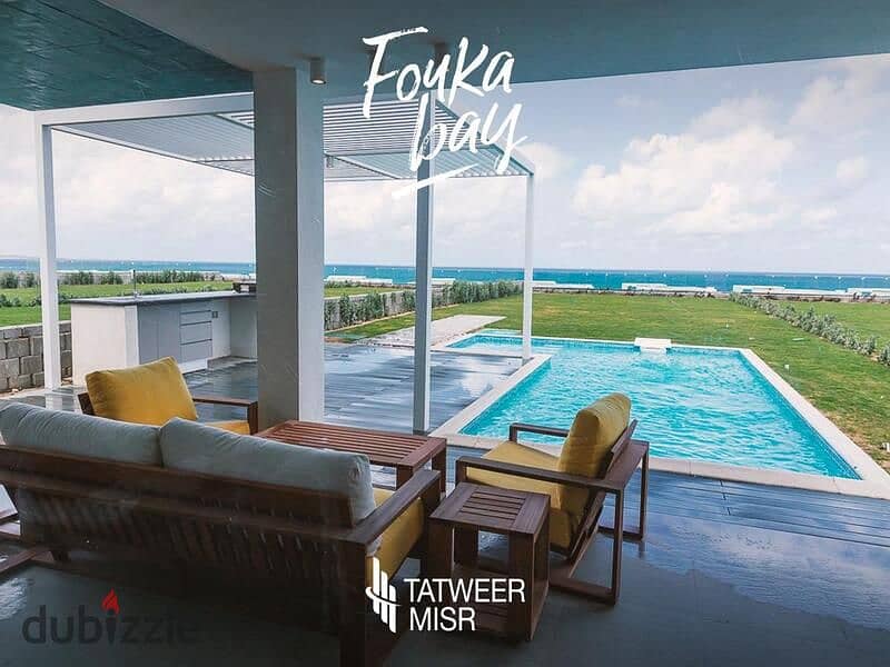 Chalet for sale in Fouka Bay Tatweer Misr, fully finished with air conditioning 5% down payment with view directly on the lagoon Special cash discount 9