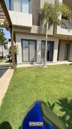 For sale, an apartment with 3 master rooms + a garden with a private entrance, in the best location and division, in front of Cairo Airport, on the Su