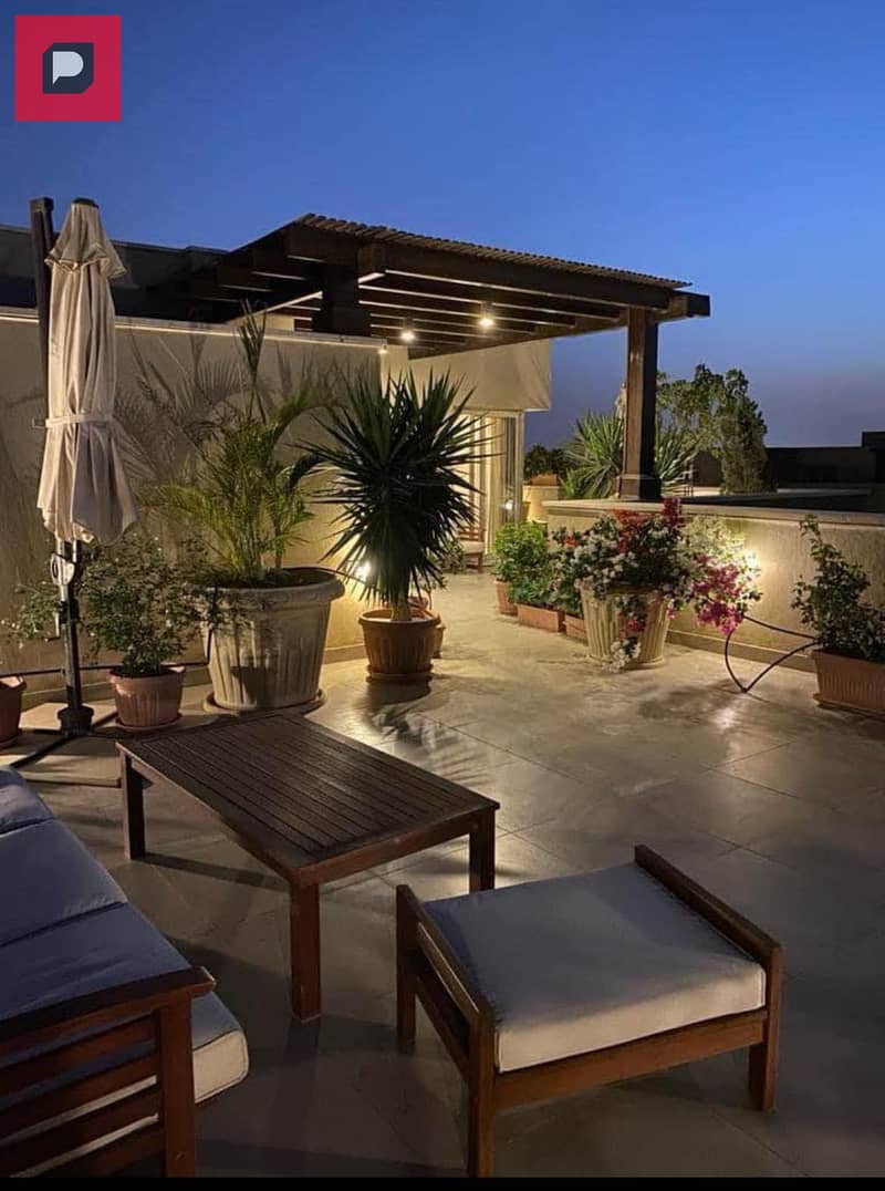 Penthouse for sale in Telal East Compound, New Cairo, next to Mountain View and next to Palm Hills, full view of the landscape and green area 17