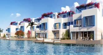 Fully finished townhouse, first row on the lagoon, in Naia Bay Ras El Hekma North Coast with a distinctive Greek design with installments over 7 years