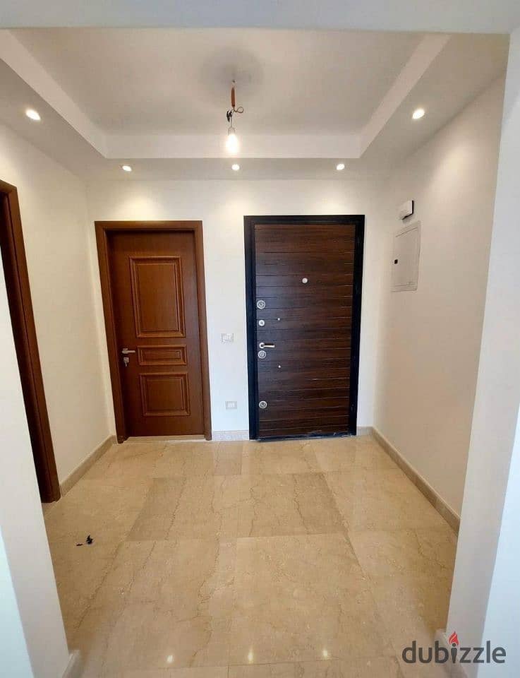 Nasr City, two minutes from your apartment in Al-Jar Sheraton Compound, next to City Center Almaza, fully finished with air conditioners and a kitchen 0