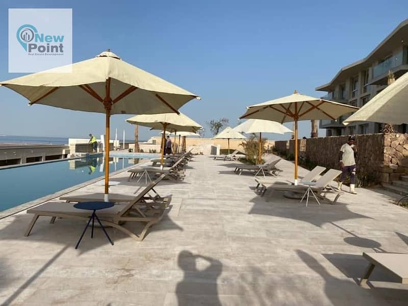 3-room chalet directly on the sea, fully finished, ultra super deluxe, for sale in the most luxurious resorts of Ain Sokhna, Il Monte Galala Resort 1