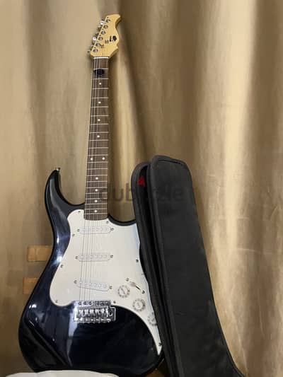 electric guitar with amp