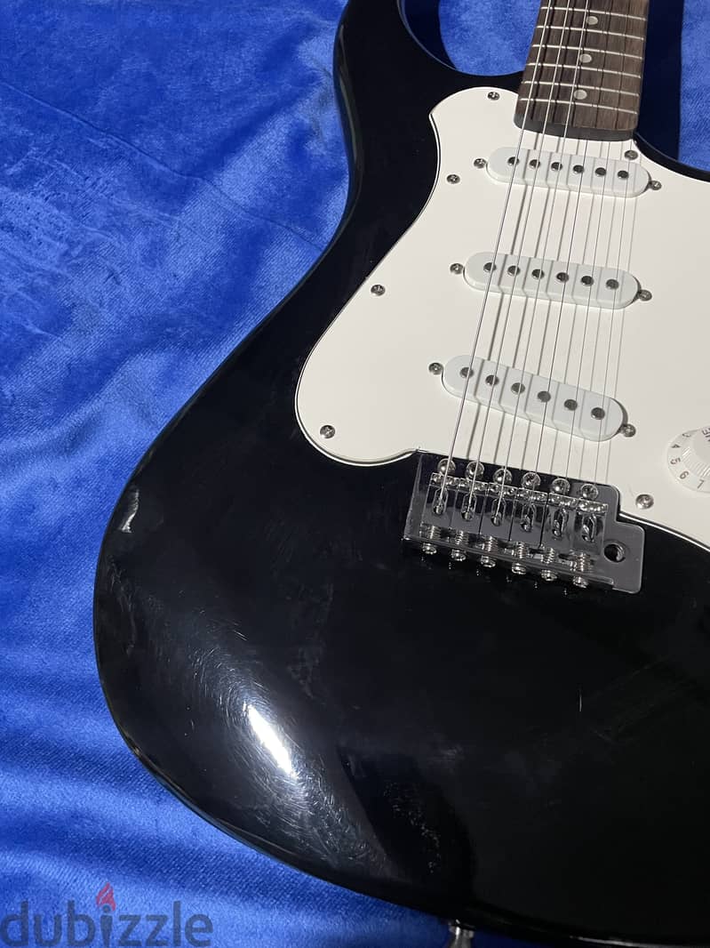 electric guitar with amp 2