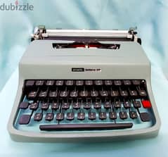 آله كاتبه شركة olivetti العالميه صناعه أسباني عمرها ٥٠ سنه بحاله نادره