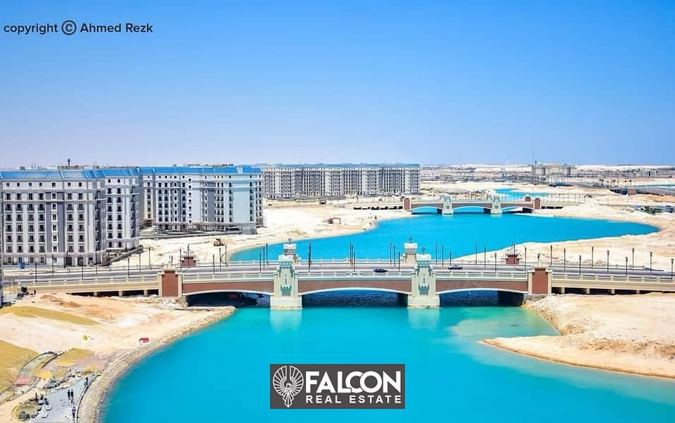 For sale, a 3-room apartment with immediate delivery, directly finished, on the lagoon and the sea, in the Latin Quarter, New Alamein 13