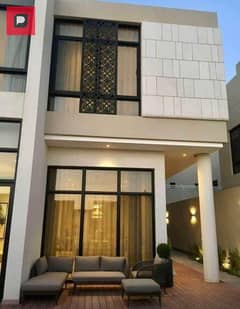 Villa for sale in the Fifth Settlement next to Swan Lake Hassan Allam in front of Al Rehab Gate, New Cairo, installments over 7 years