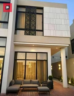 Twin house villa for sale with a very special view in State Compound in New Cairo, in front of Rehab and near the Fifth Settlement and the Airport