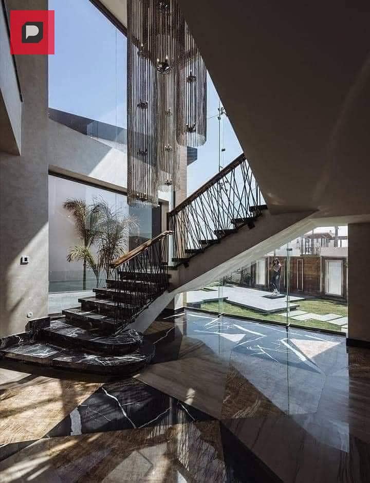 Twin house villa for sale with a very special view in State Compound in New Cairo, in front of Rehab and near the Fifth Settlement and the Airport 3