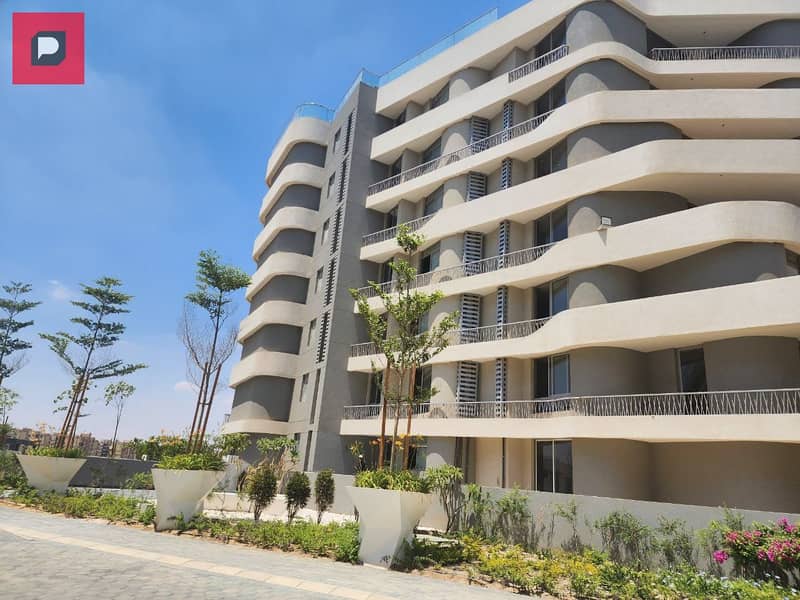 Two-bedroom apartment with a distinctive double view for sale in Bloomfields Compound in Mostakbal City near the 5th Settlement,AUC and Cairo airport 7