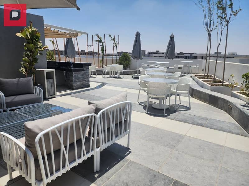 Two-bedroom apartment with a distinctive double view for sale in Bloomfields Compound in Mostakbal City near the 5th Settlement,AUC and Cairo airport 10