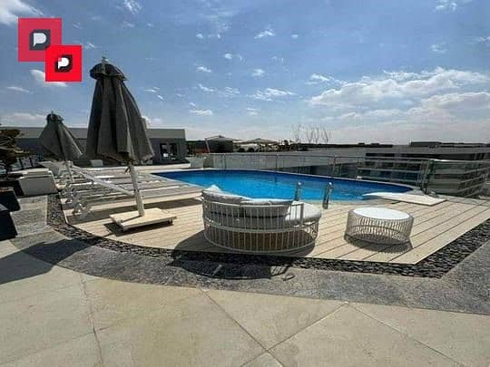 Two-bedroom apartment with a distinctive double view for sale in Bloomfields Compound in Mostakbal City near the 5th Settlement,AUC and Cairo airport 5