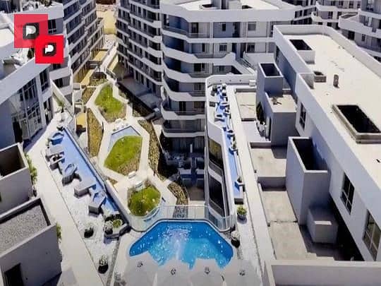 Two-bedroom apartment with a distinctive double view for sale in Bloomfields Compound in Mostakbal City near the 5th Settlement,AUC and Cairo airport 12