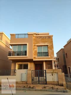 Townhouse for sale in Taj City Compound, corner, 158 m, at a competitive price, with a view of villas and green spaces in front of Cairo International