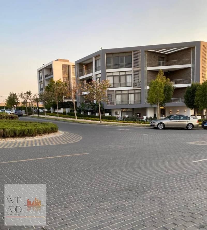 Apartment for sale in Taj City Compound, Origami Golf Phase, 132 m, very distinctive division, with the best view, with a 5% down payment and installm 15