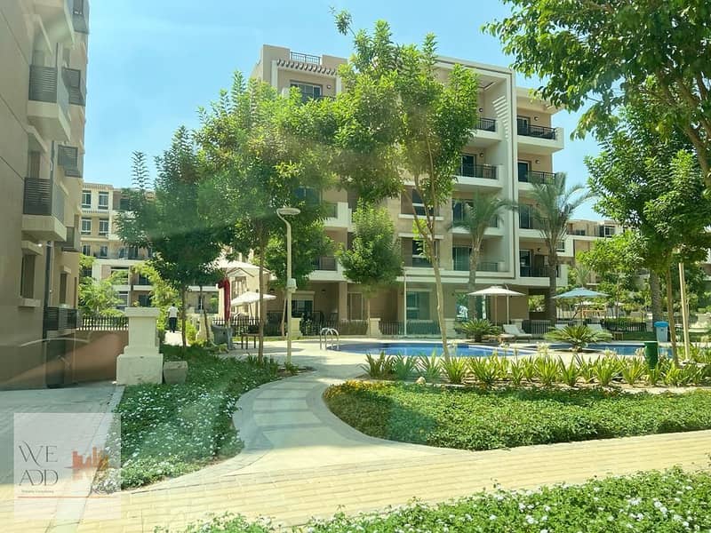 Apartment for sale in Taj City Compound, Origami Golf Phase, 132 m, very distinctive division, with the best view, with a 5% down payment and installm 28