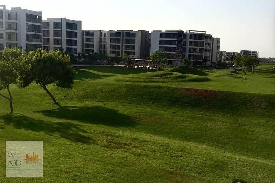 Apartment for sale in Taj City Compound, Origami Golf Phase, 132 m, very distinctive division, with the best view, with a 5% down payment and installm 29